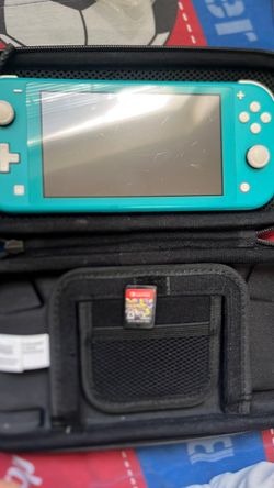 Ligh blue Nintendo switch lite 64gb