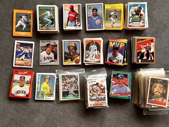 Baseball, American football, and basketball cards.