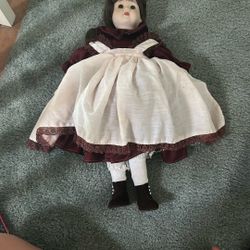 Antique Porcelain Doll With Red Outfit