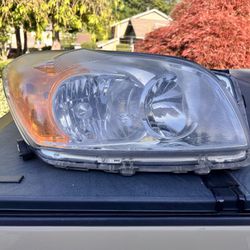 2009-2011 Toyota RAV4 -  Passenger Side Headlight, without Bulbs