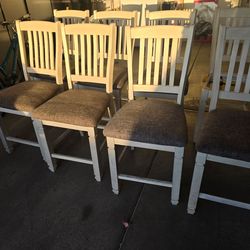 7 Ashley chairs
