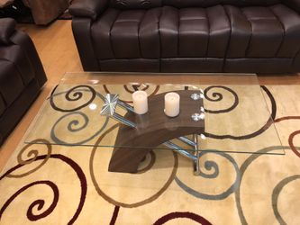 Glass top coffees table