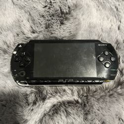 Psp with 4 games and charger