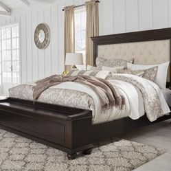 Brynhurst Dark Brown King Upholstered Storage Bed

