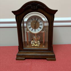 Bulova Clocks B1845 Durant Walnut Wood and Glass Revolving Pendulum Clock, Brown