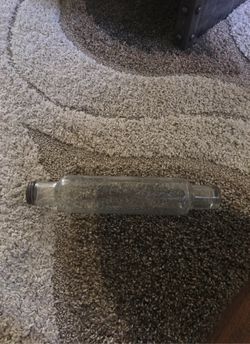 Antique glass rolling pin.