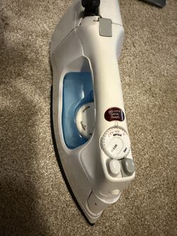 Iron With Retractable Cord