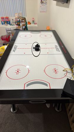 EastPoint Sports air hockey table featuring GlazeTek