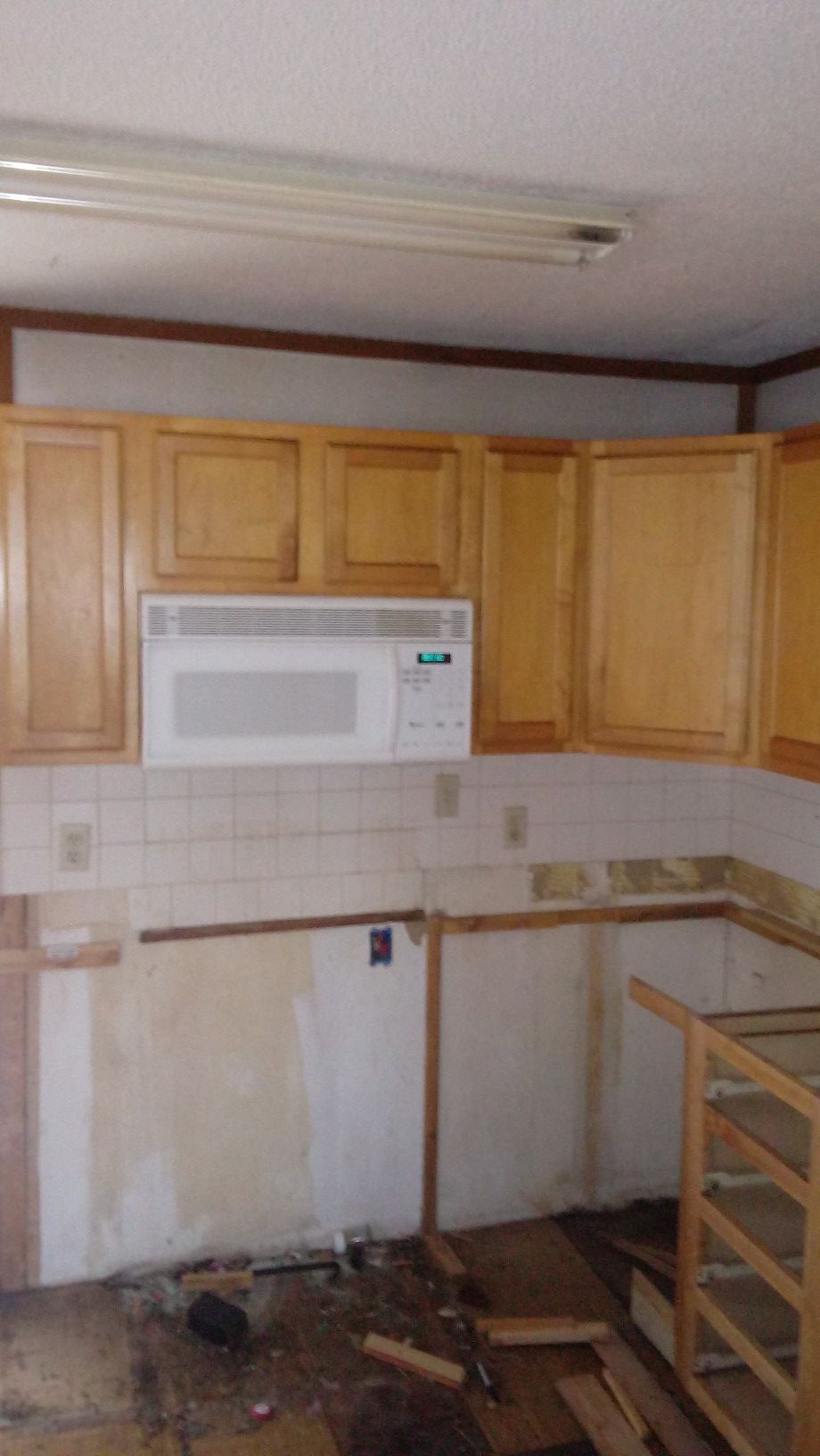 Upper kitchen cabinets and microwave