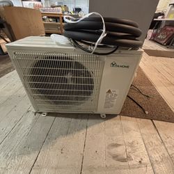 Outside And Inside Mini Split Unit 