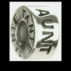 NEW Authentic Chamilia AUNT Charm.  Sterling Silver.  Hallmarked CHAM & 925.  # GE-18.  Retails for $30.00.  90% of Chamilia charms fit Pandora Bracel