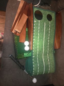 Golf putting mat
