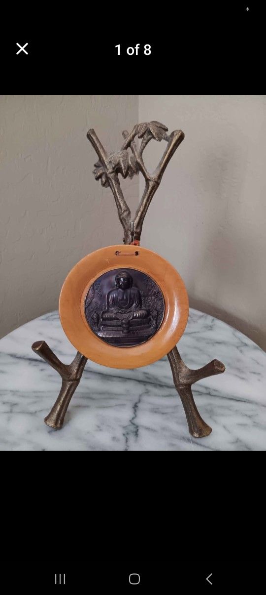 Vintage Plaque Seated Buddha
High Relief Metal on Wood 4 1/2" on a Great Metal Stand