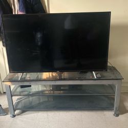 55 Inch Roku Tv And  Glass Tv Stand 