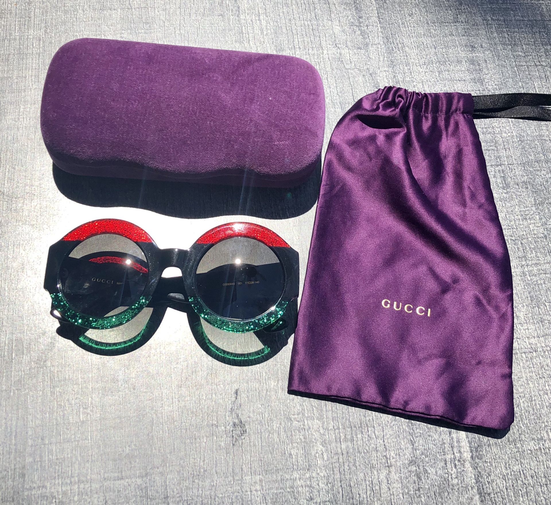 Gucci round-frame acetate sunglasses. Comes with Gucci case, Gucci cleaning cloth, Gucci protection bag.