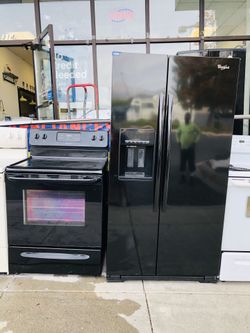 Side by side fridge and stove