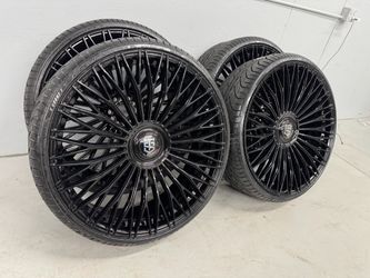 NEW 28 inch gloss black tis wheels with floating caps wrapped in lexani 295/25r28 tires