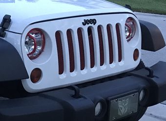 Jeep Headlight Cover. RED