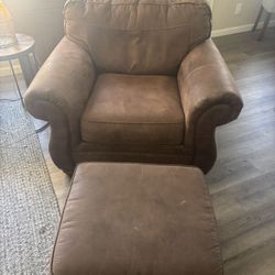 Brown Leather Armchair + Ottoman