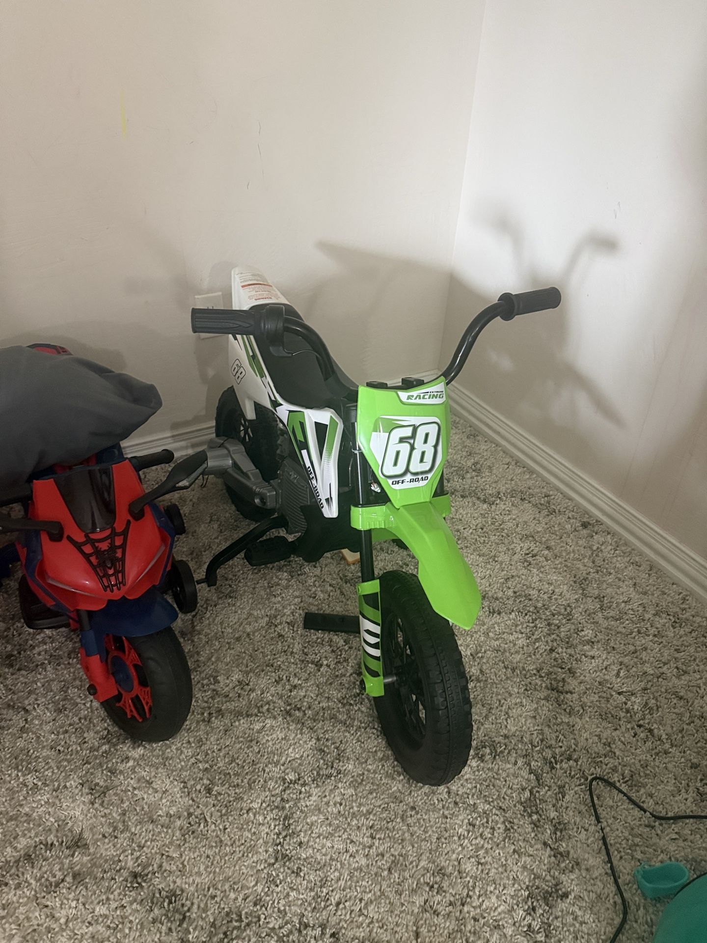 Electric Motorcycle for Kids up to 65lbs does not include red bike.