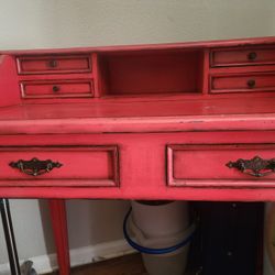 Antique red writing desk