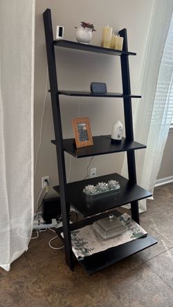 Black slanted bookcase