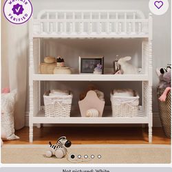 Brand new (in box) changing table and crib