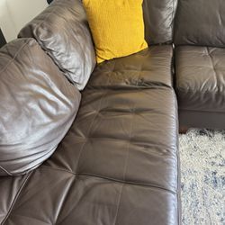 Macy’s leather L-shaped sectional 