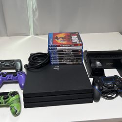 Sony PS4 Pro Bundle W/ Games, Controllers, & Oivo Vertical Cooling Charging Station
