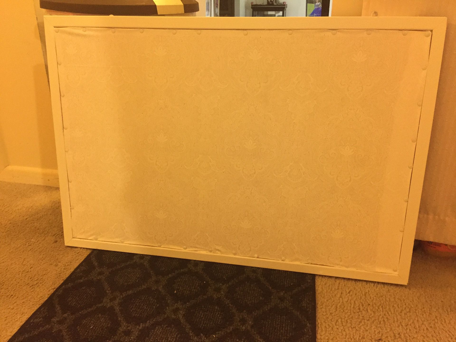 Cork Board painted white with fabric back