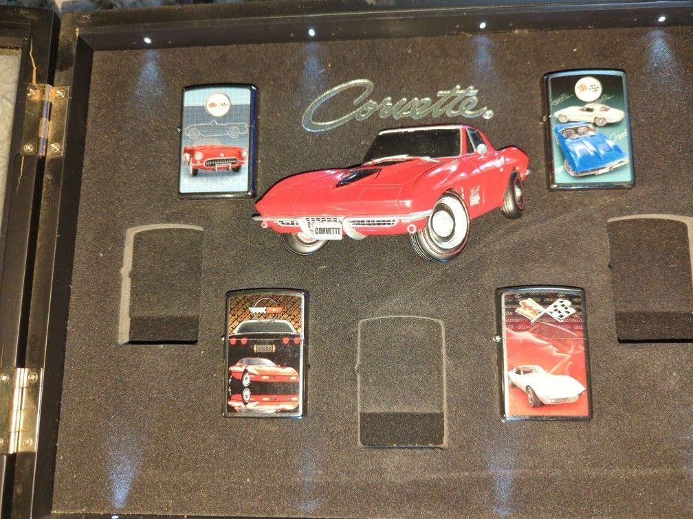 Special Edition Chevy Corvette Zippo Lighter Collection With 4 Lighters And Special Glass Case.