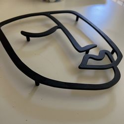 Black Metal Face Trivet 