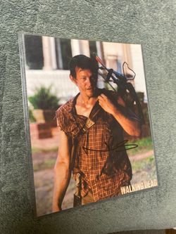 Signed Norman reedus picture with certificate