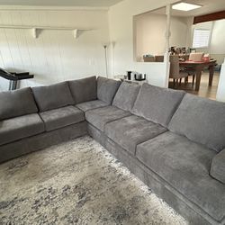 Living Spaces Grey sectional 