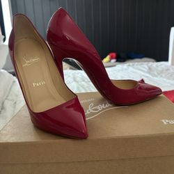 LouBoutin red bottoms size 37