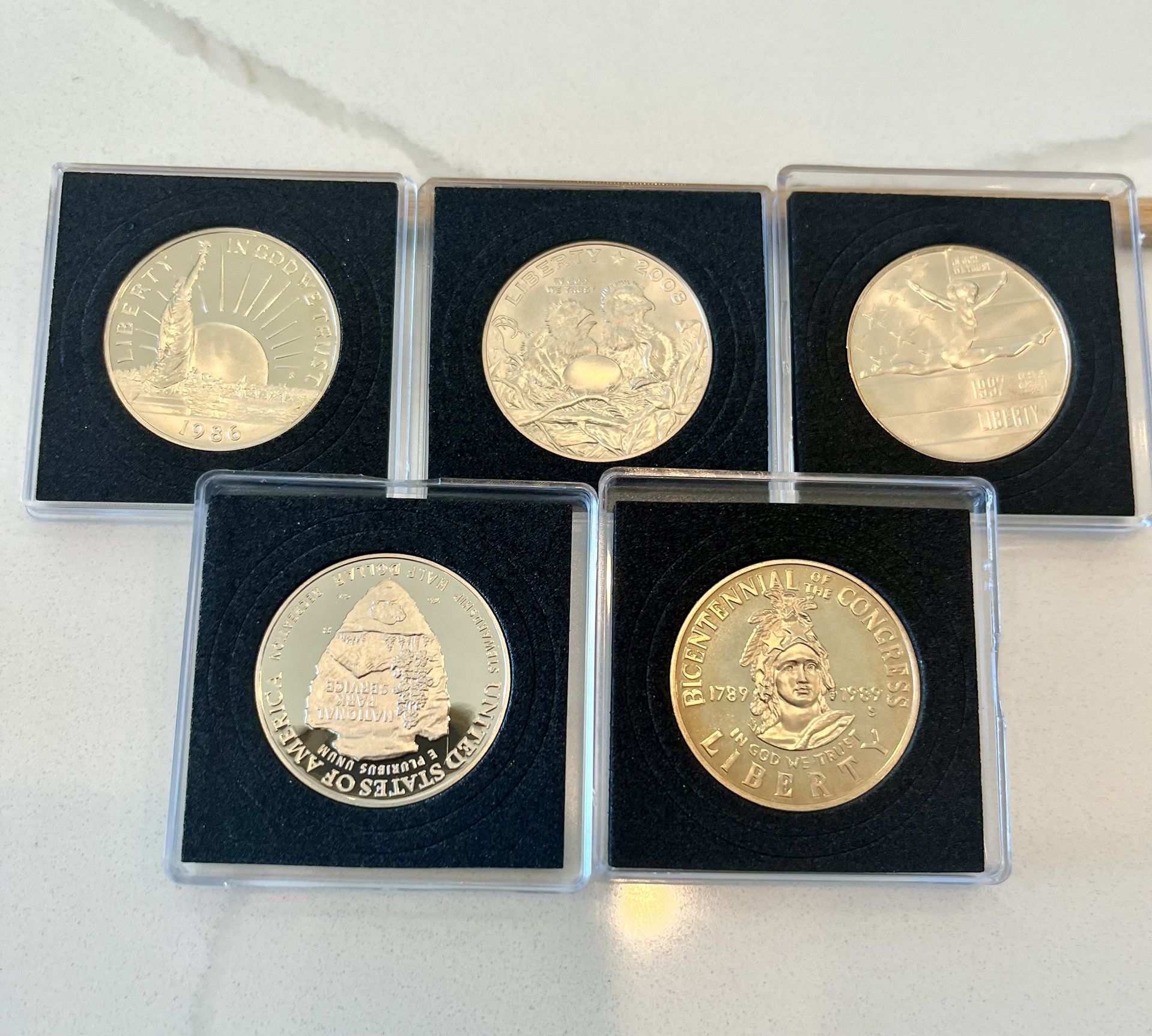 Five Commemorative Half Dollars 