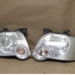 OEM 06-10 Ford Explorer Sport Trac Headlights  Used