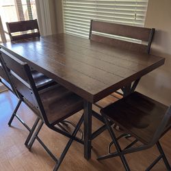 Dark oak kitchen table 4 chairs and a bench