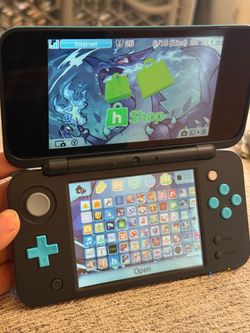 Nintendo 2DS XL with 64gb micro SD card and charger