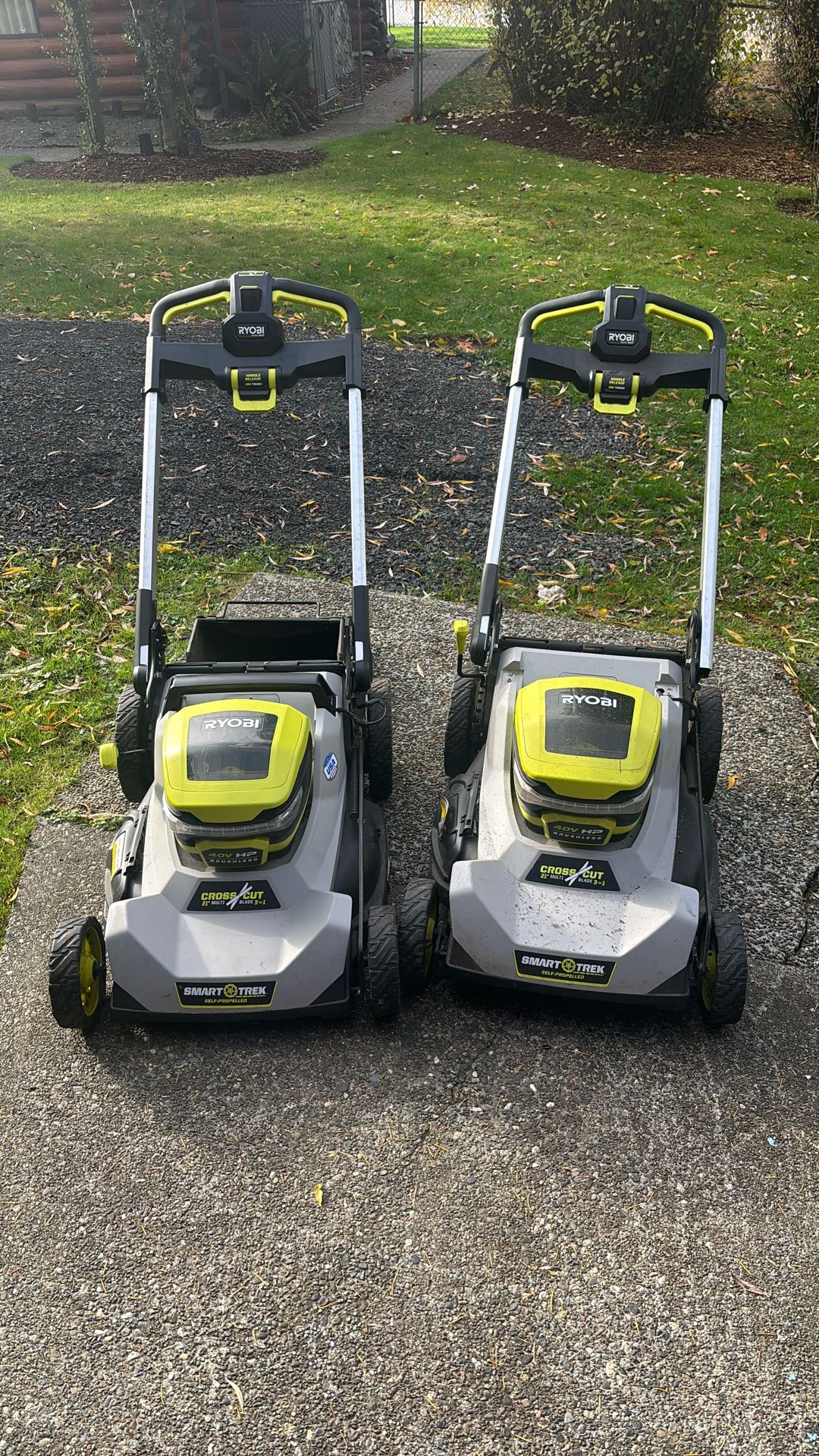 Two Ryobi 40 V mowers