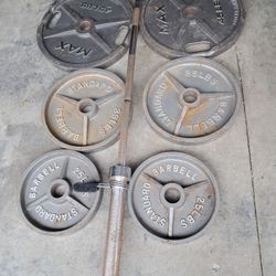 Olympic Size Weights And Barbell $200