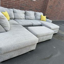 really nice 3 piece sectional couch with ottoman
