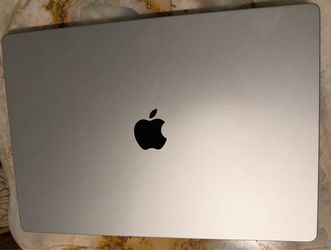 2021 14” MacBook Pro M1 Max 10 core CPU/24 core GPU, 32 GB RAM, 1TB SSD. Comes with power adapter. Small scratch on top case but everything works grea