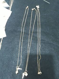 Gold plated copper chain and sliver necklace - $40 each