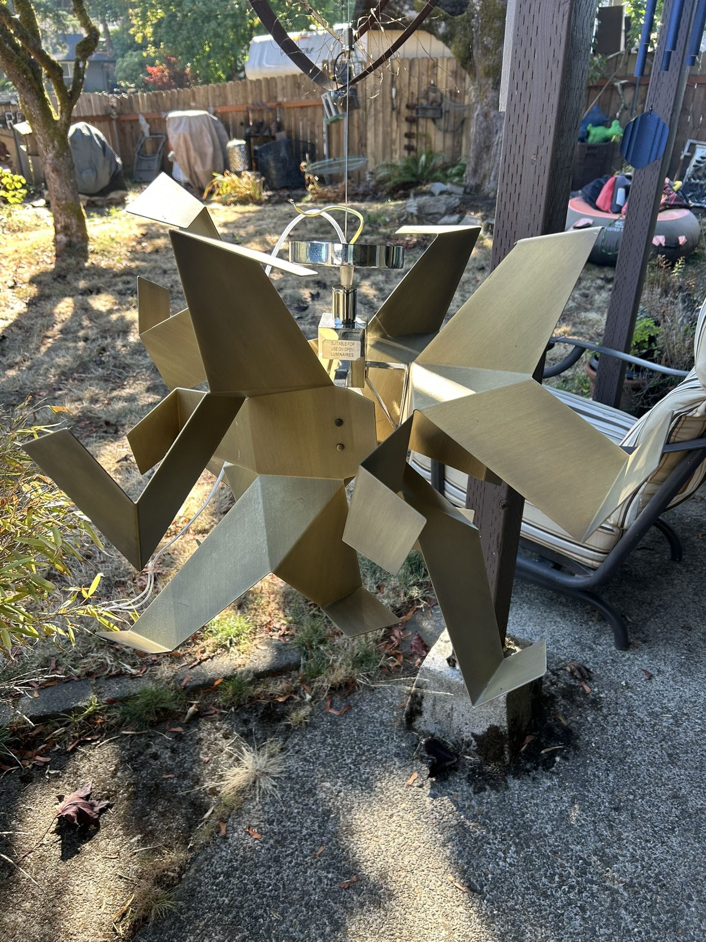 Mid-century modern looking metal chandelier in good condition. Works and looks very interesting. But it’s so hard to take a good picture of it. $50,