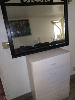 Dresser in mirror