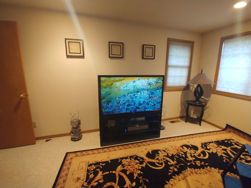 54" TV and Black stand