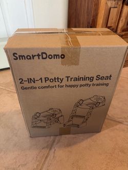 ***BRAND NEW, UNUSED, IN BOX*** All-Stage Potty, Foldable, Splash Guard, Safety Handles, Hight Adjustable