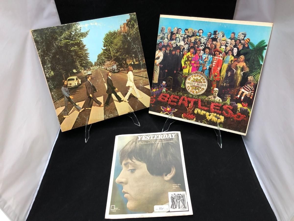 original Beatles vinyl Records and music sheet bundle.