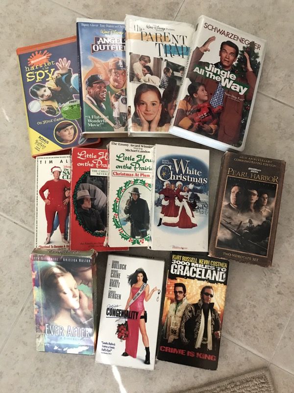 12 VHS Movies. Harriet the spy, angels in the outfield, the parent trap, jingle all the way and more